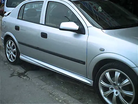 Бічні пороги HB (під фарбування) для Opel Astra G classic 1998-2012 рр — Opel Astra G classic 1998-2012 гг. DianaParts