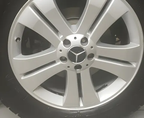 Ковпачки на диски 70/75 мм з кільцем (4 шт, чорні) для Mercedes-Benz — Mercedes-Benz DianaParts
