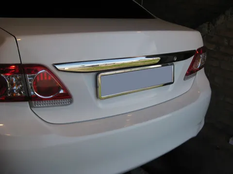 Накладка над номером 2010-2013 (нерж) для Toyota Corolla рр — Toyota Corolla 2007-2013 гг. DianaParts